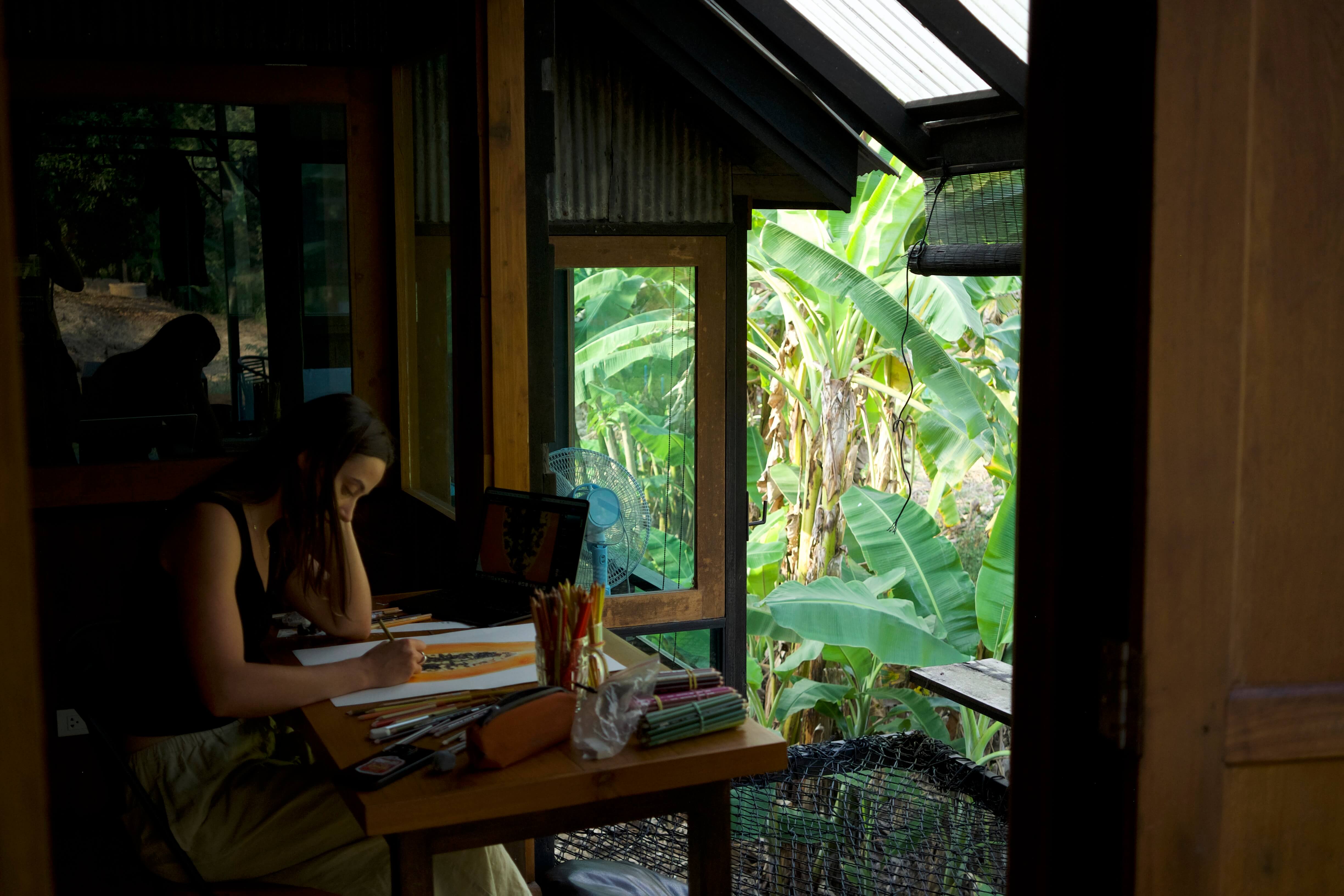 Artist working at desk